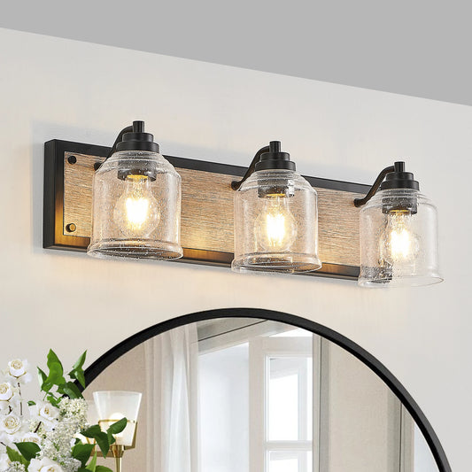 23" Farmhouse Vanity Light Fixture, 3-Light Bathroom Wall Sconce with Clear Seed Glass Shades, Black and Wood Grain Finish