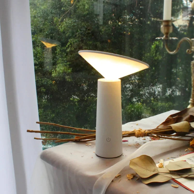 Nordic minimalist style table lamp with USB charging function for creative decoration of dining room and bedside.